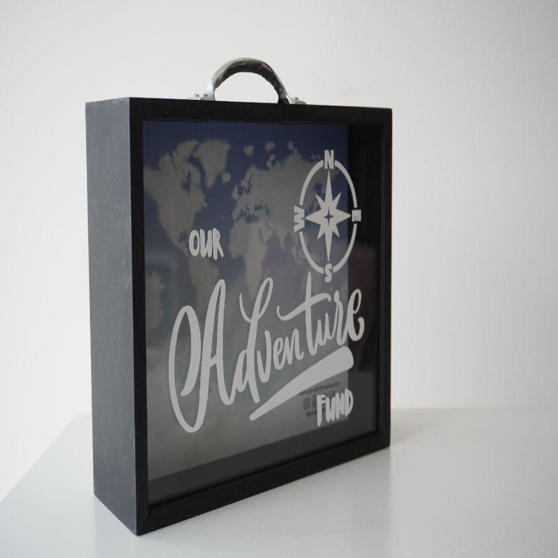 Alcancía maletín viajero doble propósito, color negra